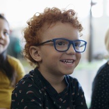 a boy focusing at school